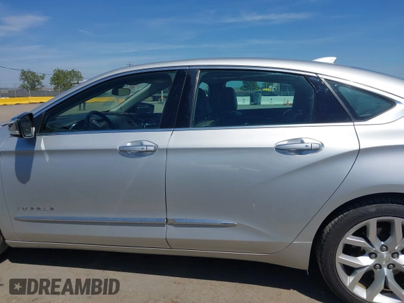 2017 Chevrolet Impala Premier with VIN 1G1145S33HU199989, listed as a IAAI auction lot 42136297 with 123,176 mi miles and . Bid and sale history available at DreamBid. Image 14.