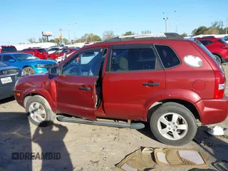 2005 Hyundai Tucson GL with VIN KM8JM12B75U108866, listed as a IAAI auction lot 41218960 with 111,319 mi miles. Bid and sale history available at carsss.com. Image 14.