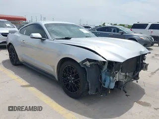2015 Ford Mustang EcoBoost with VIN 1FA6P8TH2F5383642, listed as a IAAI auction lot 42054246 with 104,061 mi miles and . Bid and sale history available at DreamBid. Image 1.