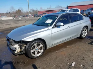 2013 BMW 3 Series 328i xDrive with VIN WBA3B5G51DNS05659, listed as a IAAI auction lot 41377886 with 159,972 mi miles. Bid and sale history available at carsss.com. Image 2.