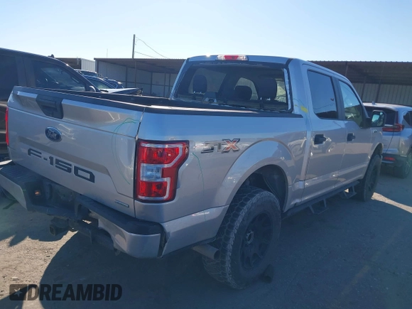 2019 Ford F-150 XL with VIN 1FTEW1CP6KFD42734, listed as a IAAI auction lot 41260505 with 101,702 mi miles and . Bid and sale history available at carsss.com. Image 4.