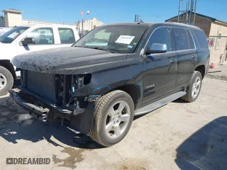 2015 Chevrolet Tahoe LTZ with VIN 1GNSCCKCXFR117525, listed as a IAAI auction lot 41839259 with 143,413 mi miles. Bid and sale history available at carsss.com. Image 19.