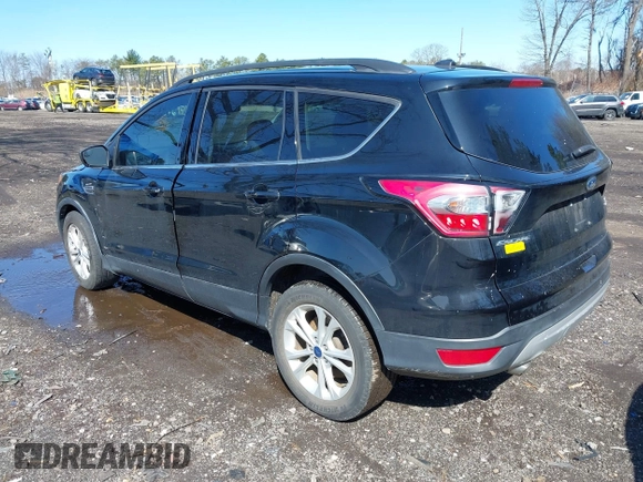 2018 Ford Escape SE with VIN 1FMCU0GD2JUA65979, listed as a IAAI auction lot 41894516 with 145,424 mi miles. Bid and sale history available at carsss.com. Image 3.