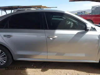 2015 Volkswagen Passat 1.8T Wolfsburg Ed with VIN 1VWAT7A31FC028990, listed as a IAAI auction lot 41778229 with 73,553 mi miles. Bid and sale history available at carsss.com. Image 13.