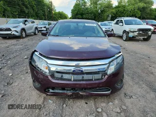 2012 Ford Fusion SE z VIN 3FAHP0HA7CR387524, wystawiony jako Copart lot #62083235 z przebiegiem 104 698 mil mil oraz Szkoda całkowita • Salvage title. Historia ofert i sprzedaży dostępna na DreamBid. Obrazek 5.