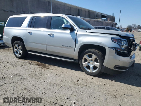 2016 Chevrolet Suburban LT with VIN 1GNSKHKC3GR394311, listed as a Copart auction lot 47304525 with 114,697 mi miles and Salvage Title. Bid and sale history available at DreamBid. Image 4.