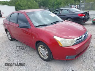 2011 Ford Focus SE with VIN 1FAHP3FN7BW189853, listed as a IAAI auction lot 42121843 with 98,921 mi miles. Bid and sale history available at carsss.com. Image 1.