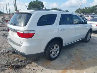 2013 Dodge Durango Crew with VIN 1C4RDHDGXDC608209, listed as a IAAI auction lot 42779231 with 203,460 mi miles and . Bid and sale history available at DreamBid. Image 4.