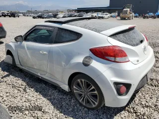 2016 Hyundai Veloster Turbo with VIN KMHTC6AE6GU302425, listed as a Copart auction lot 57547873 with 83,854 mi miles. Bid and sale history available at carsss.com. Image 2.
