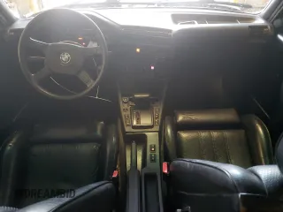 1989 BMW 3 Series 325i with VIN WBAAD2305KED23370, listed as a Copart auction lot 43777225 with 194,949 mi miles and Salvage Title. Bid and sale history available at carsss.com. Image 8.