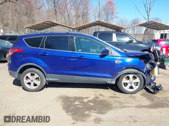 2013 Ford Escape SE with VIN 1FMCU9GX5DUB20394, listed as a IAAI auction lot 41889989 with 121,417 mi miles. Bid and sale history available at carsss.com. Image 12.