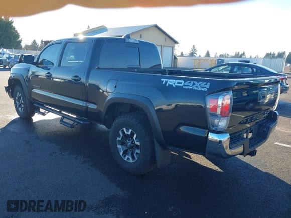 2021 Toyota Tacoma 4WD SR5 with VIN 3TMDZ5BN6MM111605, listed as a IAAI auction lot 41265774 with 68,043 mi miles. Bid and sale history available at carsss.com. Image 3.