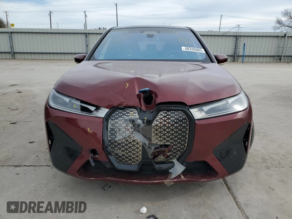 2023 BMW iX xDrive50 with VIN WB523CF01PCM76013, listed as a Copart auction lot 48326965 with 18,923 mi miles and Salvage Title. Bid and sale history available at carsss.com. Image 5.