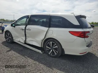2019 Honda Odyssey Touring z VIN 5FNRL6H80KB501681, wystawiony jako Copart lot #58814945 z przebiegiem 105 287 mil mil oraz Szkoda całkowita • Salvage title. Historia ofert i sprzedaży dostępna na DreamBid. Obrazek 2.