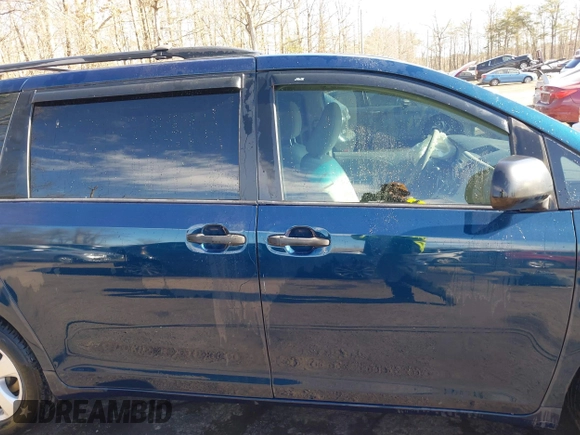 2012 Toyota Sienna with VIN 5TDKA3DCXCS013173, listed as a IAAI auction lot 41437317 with 175,263 mi miles and . Bid and sale history available at DreamBid. Image 14.