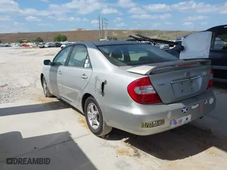 2002 Toyota Camry LE with VIN 4T1BE32K92U554994, listed as a IAAI auction lot 42095207 with 272,777 mi miles. Bid and sale history available at carsss.com. Image 3.