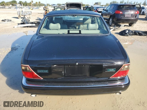 1997 Jaguar XJ with VIN SAJPX1149VC794067, listed as a Copart auction lot 85457044 with 139,764 mi miles and Clean title. Bid and sale history available at DreamBid. Image 6.