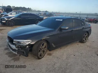 2019 BMW 5 Series M550i xDrive with VIN WBAJB9C57KB288906, listed as a Copart auction lot 79846274 with 61,744 mi miles and Salvage title. Bid and sale history available at DreamBid. Image 1.