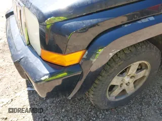 2009 Jeep Commander Sport with VIN 1J8HG48P79C541817, listed as a IAAI auction lot 41906053 with 189,436 mi miles. Bid and sale history available at carsss.com. Image 6.