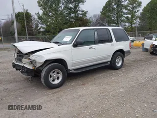 1999 Ford Explorer XLT z VIN 1FMZU32E1XZA80254, wystawiony jako IAAI lot #41453375 z przebiegiem 146 259 mil mil oraz . Historia ofert i sprzedaży dostępna na DreamBid. Obrazek 2.