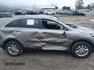 2016 Kia Sorento LX with VIN 5XYPG4A35GG149678, listed as a IAAI auction lot 41478731 with 128,895 mi miles. Bid and sale history available at carsss.com. Image 13.