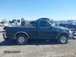 2002 Ford F-150 XL with VIN 1FTRF17W52KE24870, listed as a IAAI auction lot 42024831 with 319,578 mi miles and . Bid and sale history available at DreamBid. Image 13.