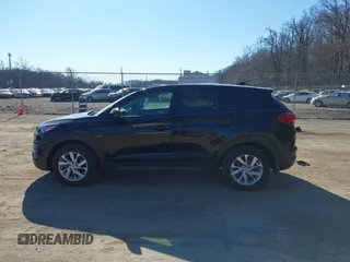 2019 Hyundai Tucson SE with VIN KM8J2CA46KU073107, listed as a IAAI auction lot 41648453 with 58,417 mi miles. Bid and sale history available at carsss.com. Image 14.