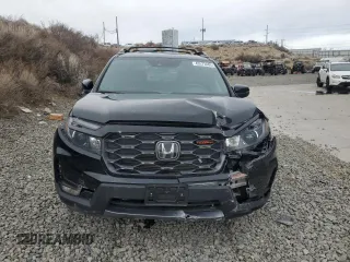 2023 Honda Passport TrailSport with VIN 5FNYF8H63PB010963, listed as a Copart auction lot 43573485 with 18,610 mi miles and Salvage title. Bid and sale history available at DreamBid. Image 5.