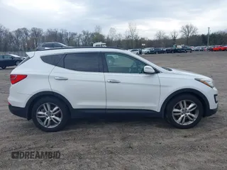 2013 Hyundai Santa Fe Sport z VIN 5XYZUDLA8DG079795, wystawiony jako IAAI lot #42035743 z przebiegiem 170 321 mil mil oraz . Historia ofert i sprzedaży dostępna na DreamBid. Obrazek 13.
