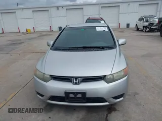 2006 Honda Civic Cpe LX with VIN 2HGFG12606H568106, listed as a IAAI auction lot 41983712 with 196,957 mi miles. Bid and sale history available at carsss.com. Image 12.