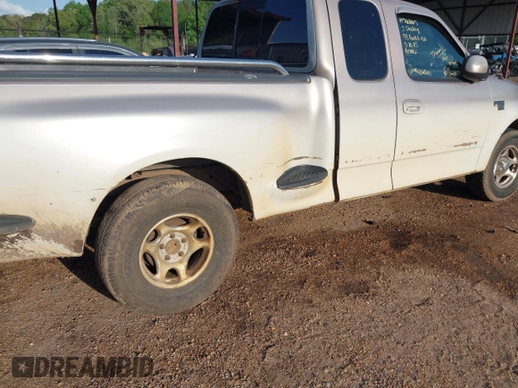 1998 Ford F-150 XL with VIN 1FTRX07L1WKA76665, listed as a IAAI auction lot 41863626 with 30,654 mi miles. Bid and sale history available at carsss.com. Image 12.