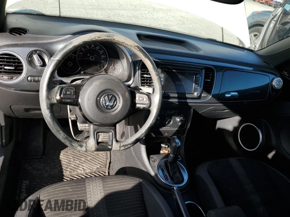 2012 Volkswagen Beetle 2.0T Turbo w/Sun/Snd/Nav PZEV with VIN 3VWVA7AT7CM631038, listed as a Copart auction lot 50749973 with 75,581 mi miles and Salvage Title. Bid and sale history available at carsss.com. Image 8.