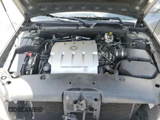 2005 Cadillac DeVille z VIN 1G6KD54Y65U205965, wystawiony jako Copart lot #58630405 z przebiegiem 129 448 mil mil oraz Czysty tytuł • Clean title. Historia ofert i sprzedaży dostępna na DreamBid. Obrazek 11.