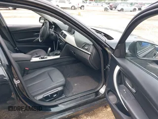 2014 BMW 3 Series 320i with VIN WBA3B1C52EK135610, listed as a IAAI auction lot 42274086 with 69,536 mi miles and . Bid and sale history available at DreamBid. Image 5.