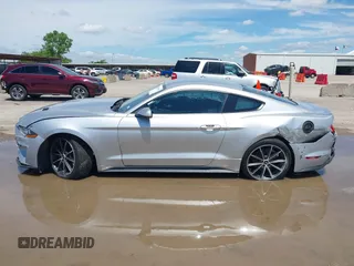 2018 Ford Mustang EcoBoost with VIN 1FA6P8THXJ5128830, listed as a IAAI auction lot 42192673 with 58,817 mi miles and . Bid and sale history available at DreamBid. Image 15.