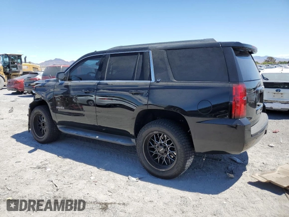 2015 Chevrolet Tahoe LT with VIN 1GNSCBKC6FR297726, listed as a Copart auction lot 55097475 with 114,471 mi miles and Salvage title. Bid and sale history available at DreamBid. Image 2.