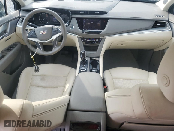 2022 Cadillac XT5 AWD Premium Luxury with VIN 1GYKNDRS9NZ126988, listed as a Copart auction lot 61019965 with 30,189 mi miles and Salvage title. Bid and sale history available at DreamBid. Image 8.