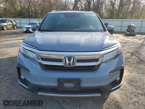 2022 Honda Pilot Touring 7-Passenger with VIN 5FNYF5H69NB031537, listed as a Copart auction lot 48986685 with 88,301 mi miles and Salvage title. Bid and sale history available at DreamBid. Image 5.