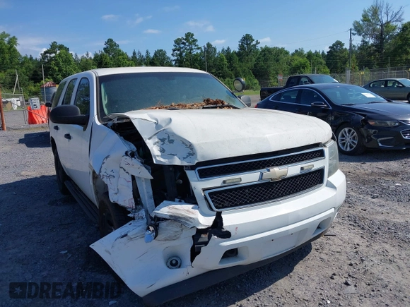 2011 Chevrolet Tahoe Commercial with VIN 1GNLC2E04BR293125, listed as a IAAI auction lot 42476037 with 123,666 mi miles and . Bid and sale history available at DreamBid. Image 6.