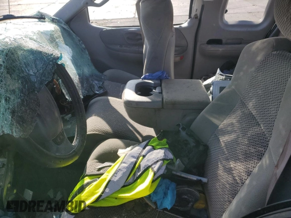 2002 Ford F-150 XL with VIN 1FTRX18L12NA01509, listed as a Copart auction lot 51098435 with Not provided miles and Salvage title. Bid and sale history available at DreamBid. Image 7.