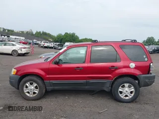 2004 Ford Escape XLT with VIN 1FMYU93154DA14180, listed as a IAAI auction lot 42430706 with 266,213 mi miles and . Bid and sale history available at DreamBid. Image 14.