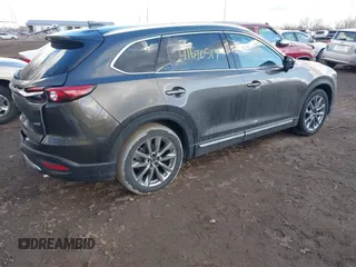 2019 Mazda CX-9 Grand Touring with VIN JM3TCBDY3K0331505, listed as a IAAI auction lot 41690517 with 64,520 mi miles. Bid and sale history available at carsss.com. Image 4.