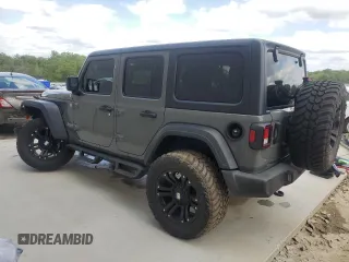 2020 Jeep Wrangler Unlimited Sport with VIN 1C4HJXDG6LW311546, listed as a Copart auction lot 51675395 with 27,679 mi miles and Salvage title. Bid and sale history available at DreamBid. Image 2.