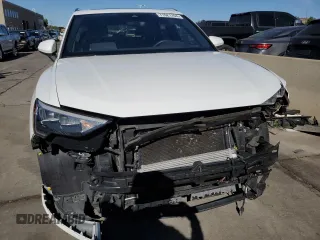 2021 Audi Q3 Premium with VIN WA1AUCF38M1067676, listed as a Copart auction lot 71621704 with 77,395 mi miles and Salvage Title. Bid and sale history available at carsss.com. Image 5.