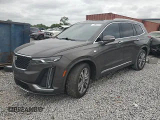 2020 Cadillac XT6 FWD Premium Luxury with VIN 1GYKPCRS4LZ133123, listed as a Copart auction lot 59411115 with 64,463 mi miles and Salvage title. Bid and sale history available at DreamBid. Image 1.