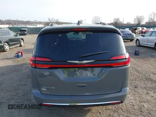 2021 Chrysler Pacifica Touring L with VIN 2C4RC1BG4MR598328, listed as a IAAI auction lot 41749306 with 78,035 mi miles and . Bid and sale history available at DreamBid. Image 16.