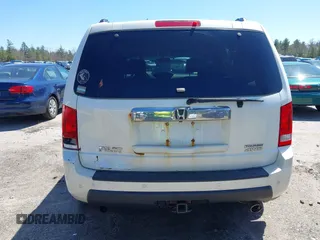 2011 Honda Pilot Touring with VIN 5FNYF4H98BB087713, listed as a IAAI auction lot 42132764 with 250,507 mi miles. Bid and sale history available at carsss.com. Image 17.