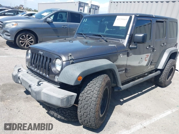 2016 Jeep Wrangler Unlimited Sport z VIN 1C4BJWDG7GL229364, wystawiony jako IAAI lot #42239069 z przebiegiem 87 001 mil mil oraz . Historia ofert i sprzedaży dostępna na DreamBid. Obrazek 17.