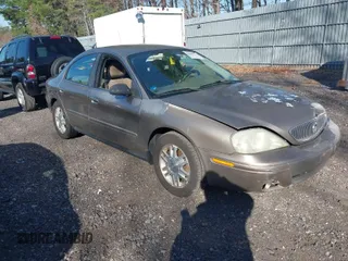 2004 Mercury Sable GS with VIN 1MEFM50U44G608274, listed as a IAAI auction lot 42064275 with 163,420 mi miles. Bid and sale history available at carsss.com. Image 1.