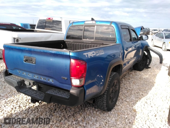 2016 Toyota Tacoma SR with VIN 5TFCZ5AN0GX045905, listed as a Copart auction lot 51798555 with 104,292 mi miles and Salvage Title. Bid and sale history available at DreamBid. Image 3.